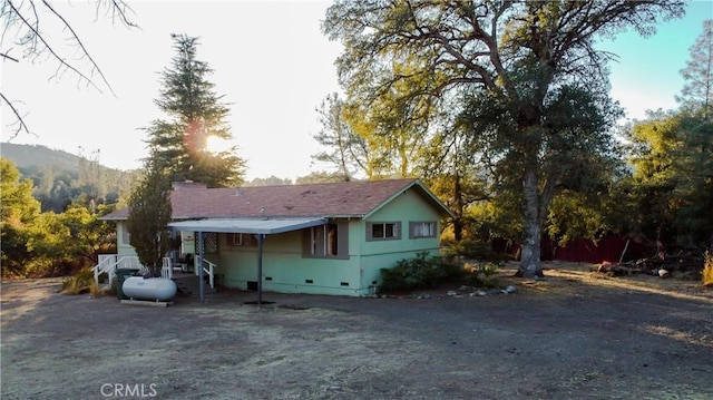 view of front of property with a mountain view