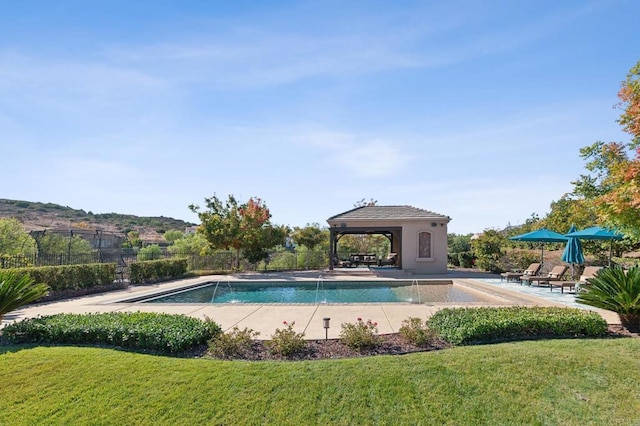 view of pool featuring a patio area, a gazebo, and a yard