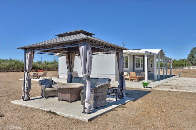 view of patio / terrace with a gazebo and an outdoor hangout area