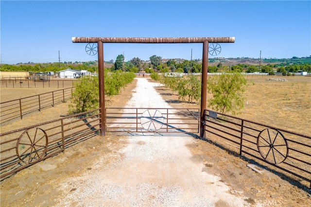 exterior space featuring a rural view