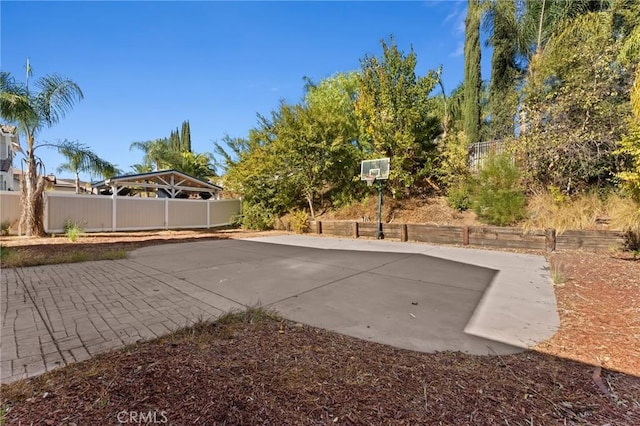 view of patio / terrace featuring basketball court