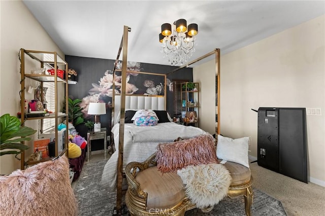 carpeted bedroom featuring an inviting chandelier