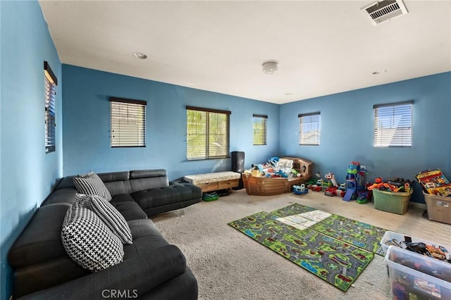 game room featuring carpet flooring and a wealth of natural light