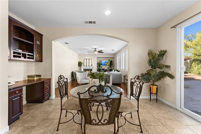 dining room featuring ceiling fan