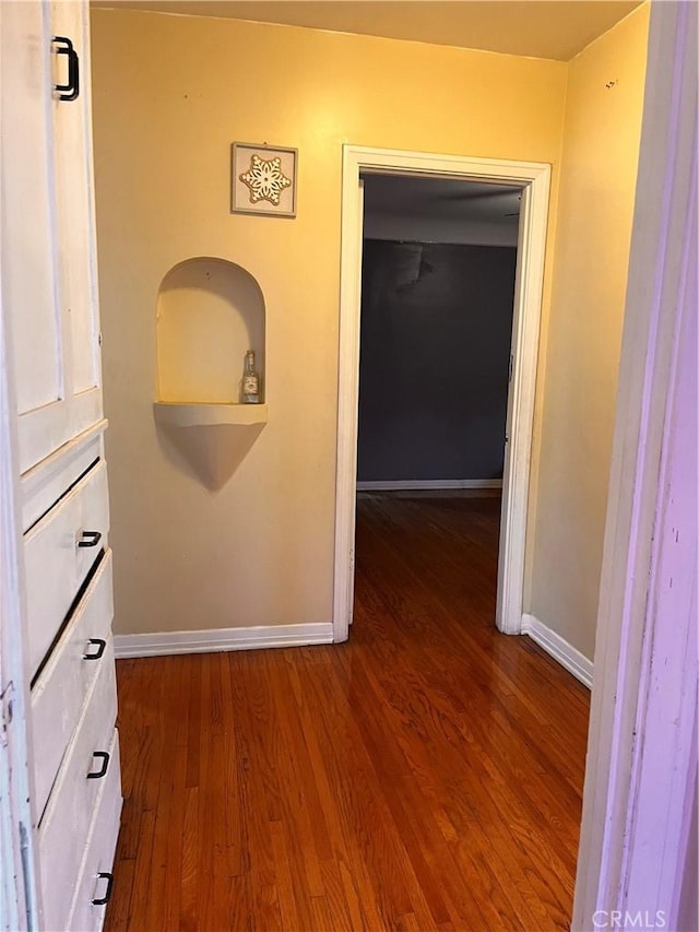 hallway featuring hardwood / wood-style floors