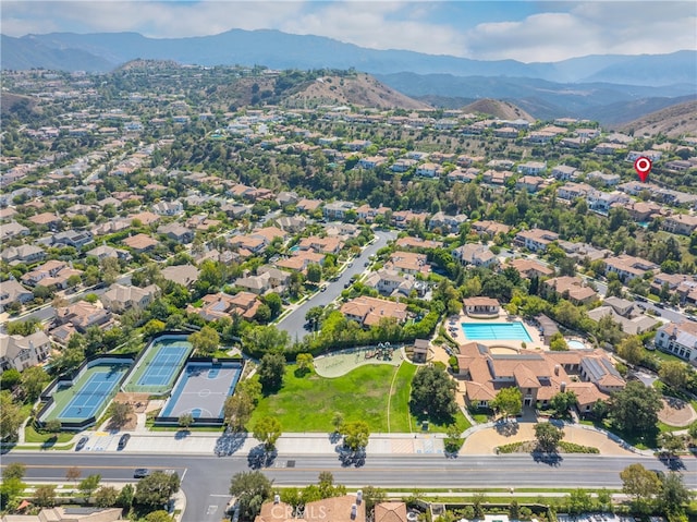 drone / aerial view featuring a mountain view