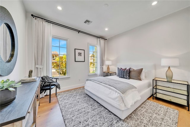 bedroom featuring light hardwood / wood-style floors