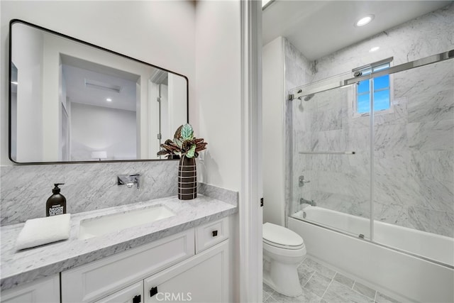 full bathroom with vanity, toilet, enclosed tub / shower combo, and backsplash