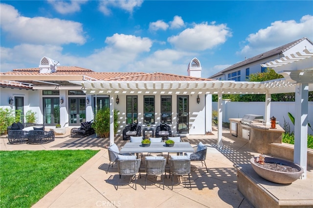 back of property featuring french doors, area for grilling, a patio area, and a pergola