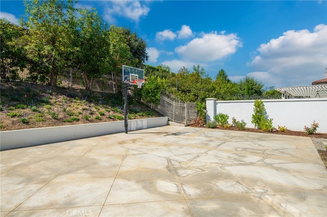 view of patio / terrace featuring basketball hoop