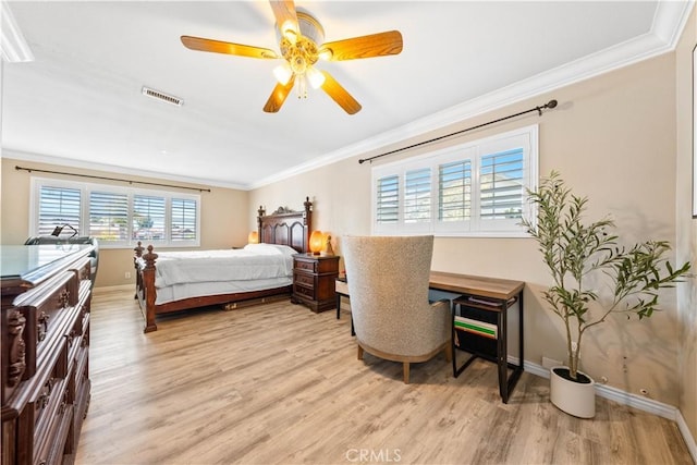 bedroom featuring ceiling fan, light wood-type flooring, and ornamental molding