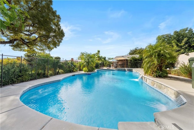 view of pool with pool water feature