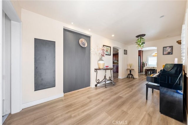 living room with light hardwood / wood-style floors