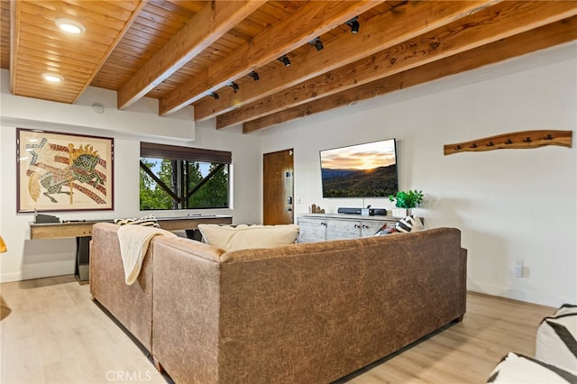 living room with beamed ceiling, light hardwood / wood-style flooring, and wooden ceiling