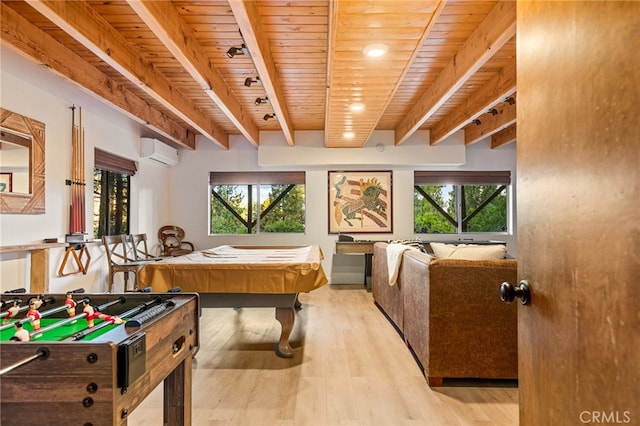 recreation room featuring light hardwood / wood-style floors, an AC wall unit, wooden ceiling, and a wealth of natural light