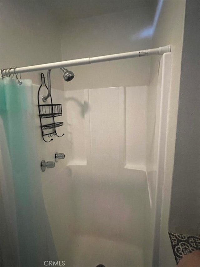 bathroom with walk in shower