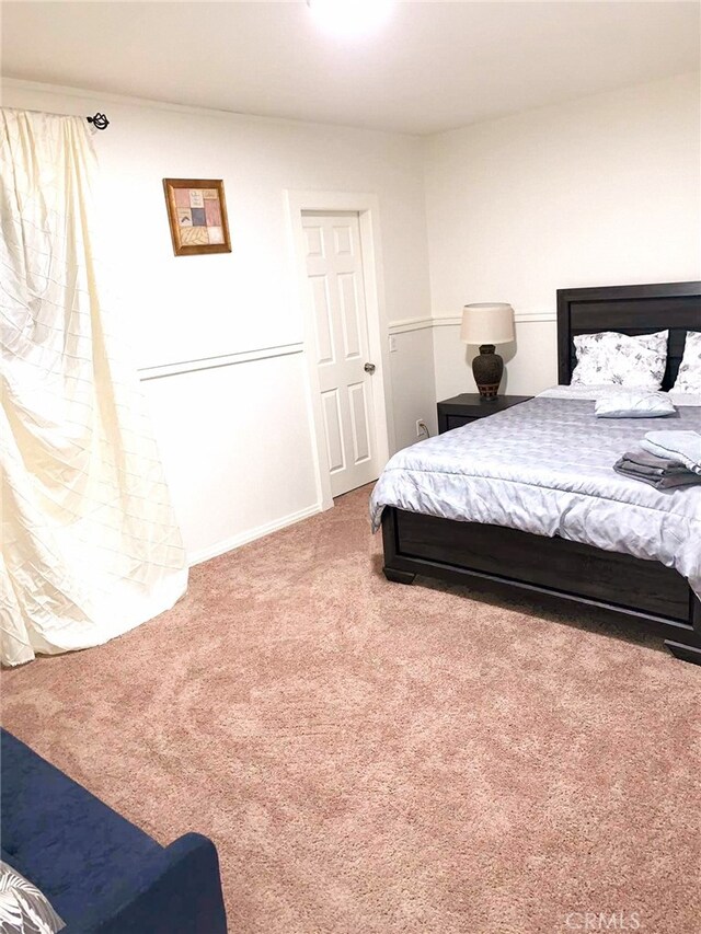 bedroom featuring carpet flooring