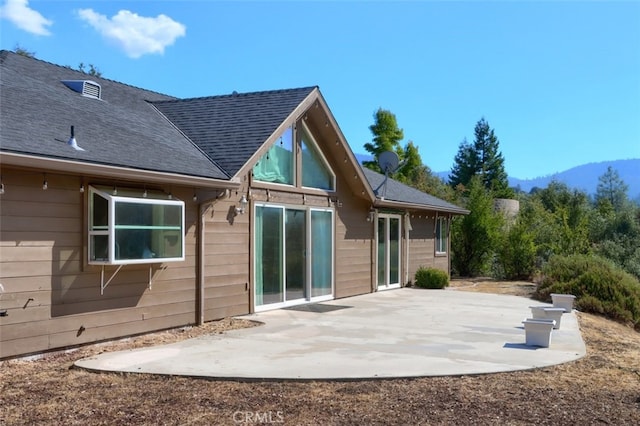 rear view of property with a patio