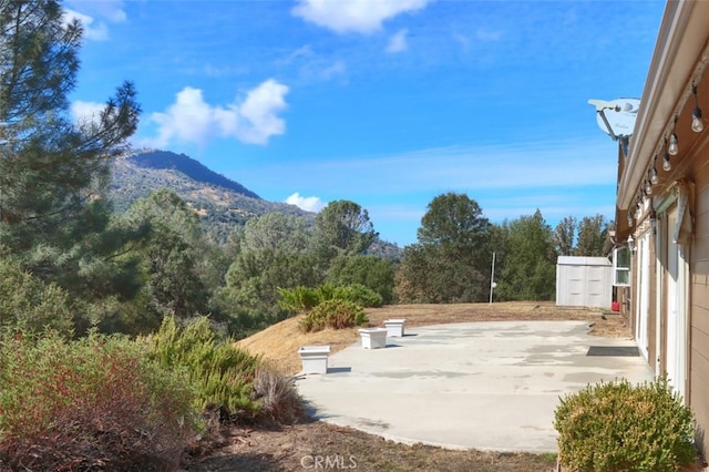 view of patio with a mountain view