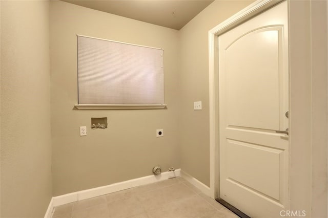 laundry room with light tile patterned floors, washer hookup, and hookup for an electric dryer