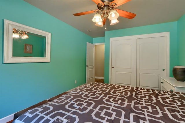 unfurnished bedroom with a closet and ceiling fan