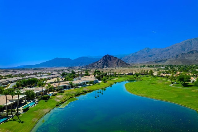 view of home's community featuring a water and mountain view