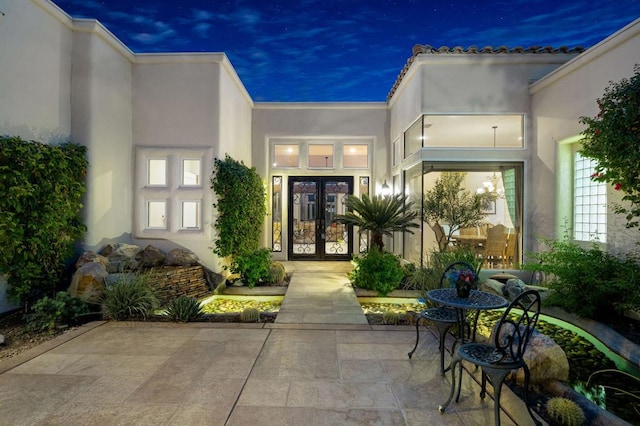 view of exterior entry with french doors