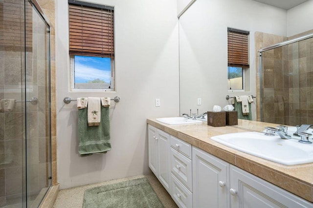 bathroom featuring vanity and walk in shower