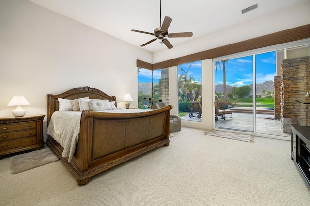 bedroom featuring access to exterior, carpet floors, and ceiling fan