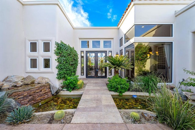 view of exterior entry with french doors