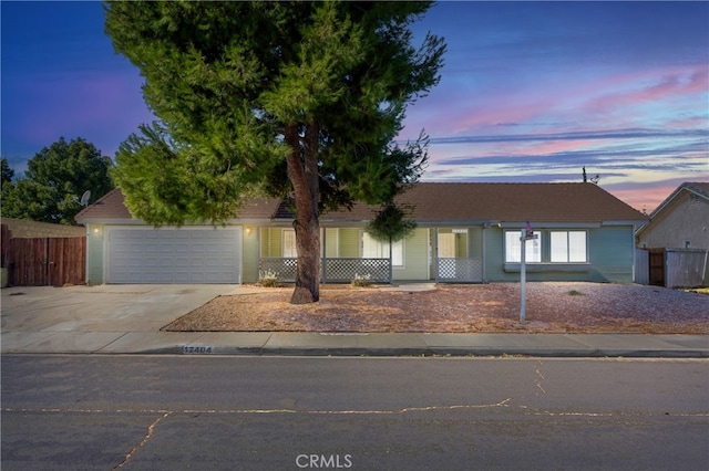 single story home featuring a garage