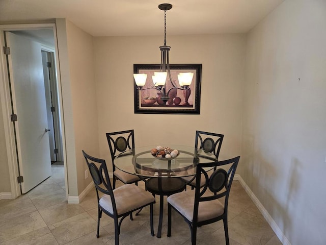 dining room featuring an inviting chandelier