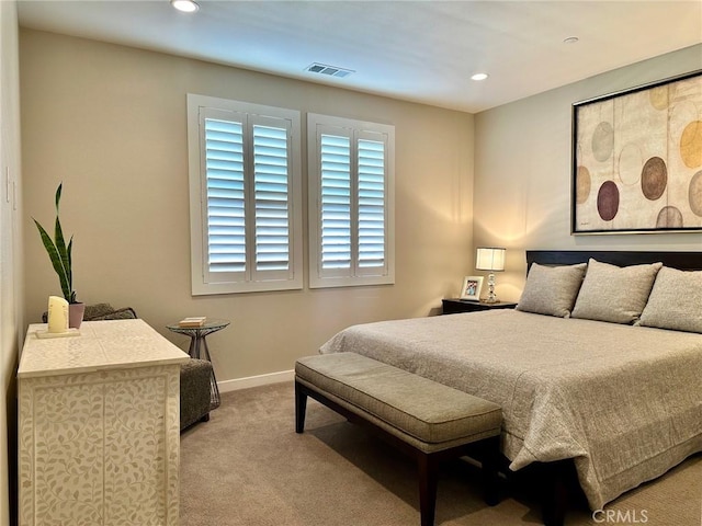 bedroom with visible vents, recessed lighting, carpet, and baseboards