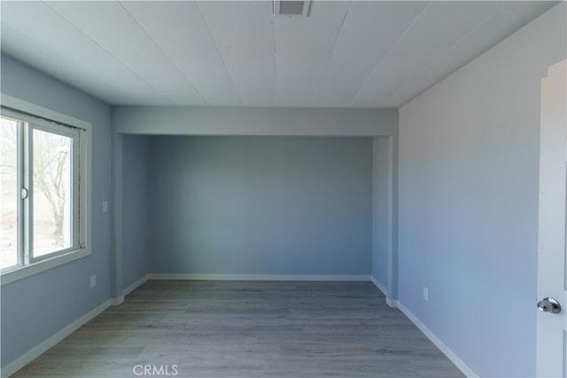 empty room featuring light hardwood / wood-style floors