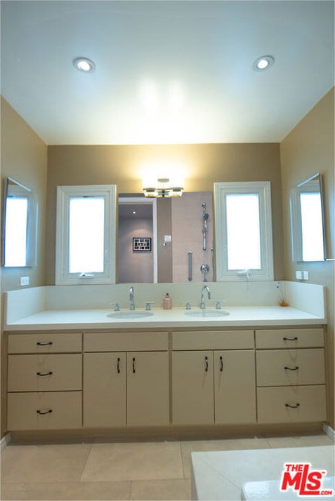 bathroom featuring tile patterned floors, plenty of natural light, and vanity