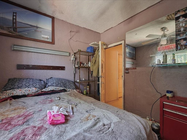 bedroom featuring ceiling fan