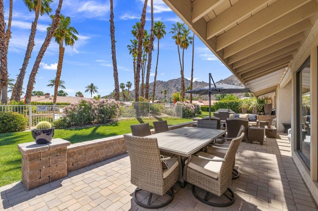 view of patio featuring a mountain view and an outdoor hangout area