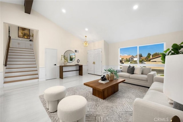 living room with beam ceiling, high vaulted ceiling, a notable chandelier, and light tile patterned flooring