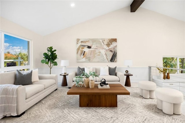 living room featuring lofted ceiling with beams