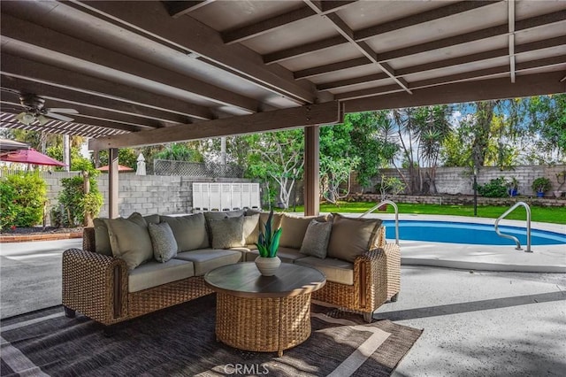 view of patio featuring a fenced in pool and an outdoor hangout area