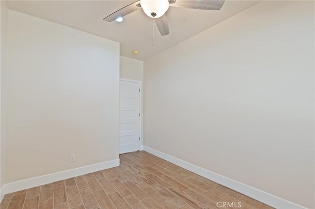 unfurnished room with ceiling fan and light wood-type flooring