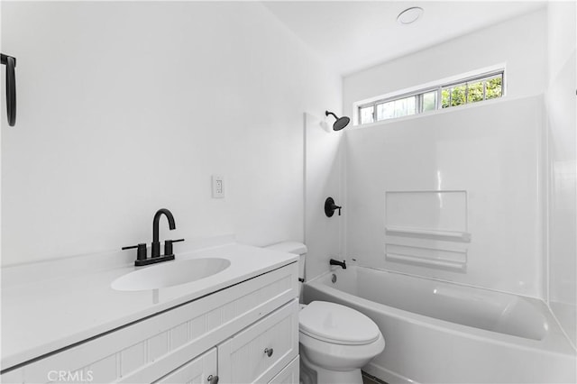 full bathroom with vanity, shower / bathtub combination, and toilet