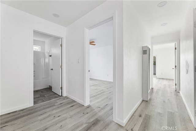 hall featuring light hardwood / wood-style floors