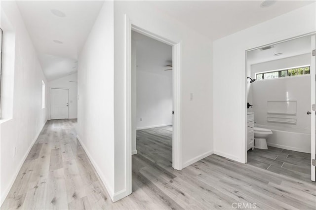 hall featuring light hardwood / wood-style floors