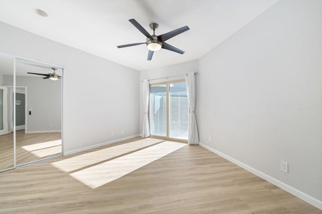 interior space featuring a closet, light hardwood / wood-style floors, and ceiling fan