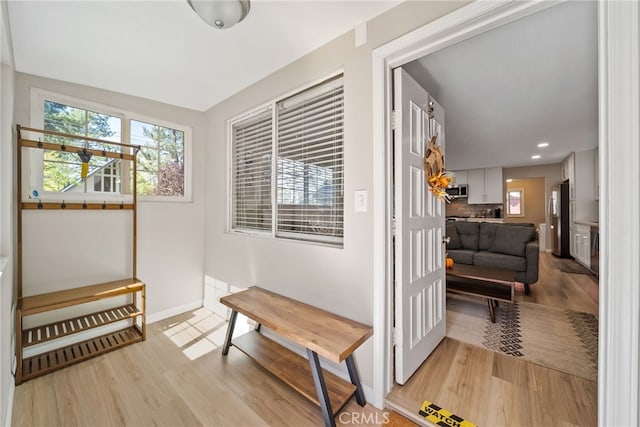 191 Los Angeles Ave, Sugarloaf, CA 92386 - hall with light wood-style flooring, baseboards, and recessed lighting