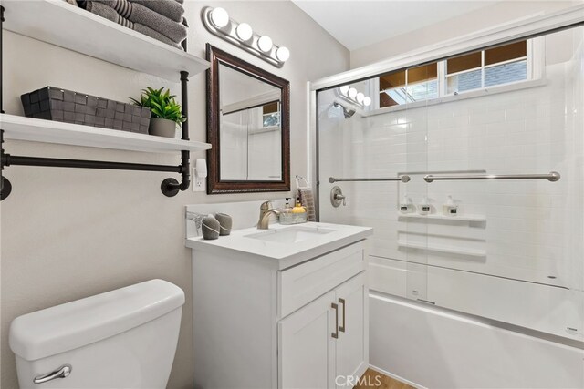 191 Los Angeles Ave, Sugarloaf, CA 92386 - bathroom featuring toilet, vanity, and shower / bath combination with glass door