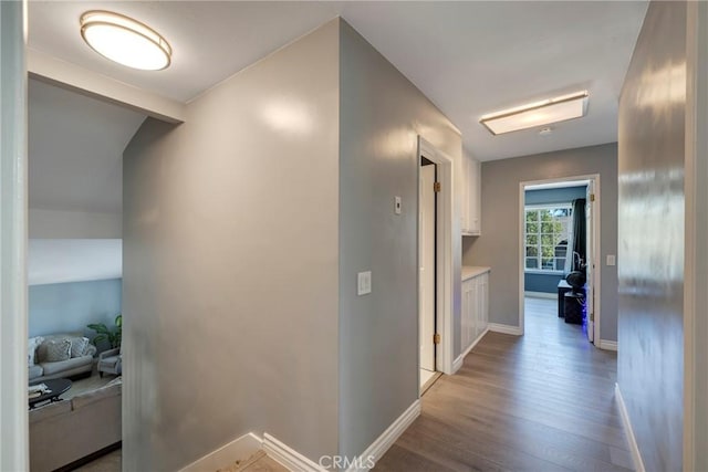 corridor featuring hardwood / wood-style flooring