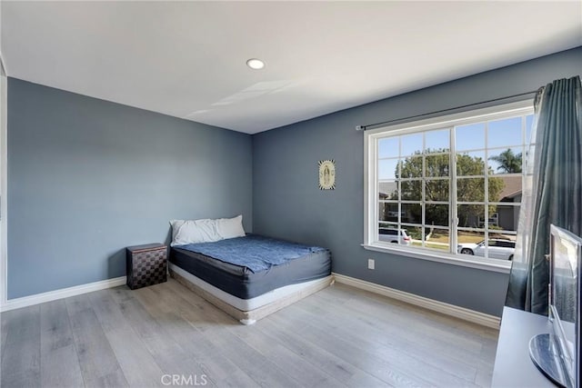 bedroom featuring light hardwood / wood-style floors