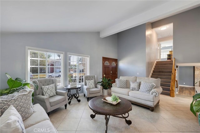 living room featuring light tile patterned floors and lofted ceiling